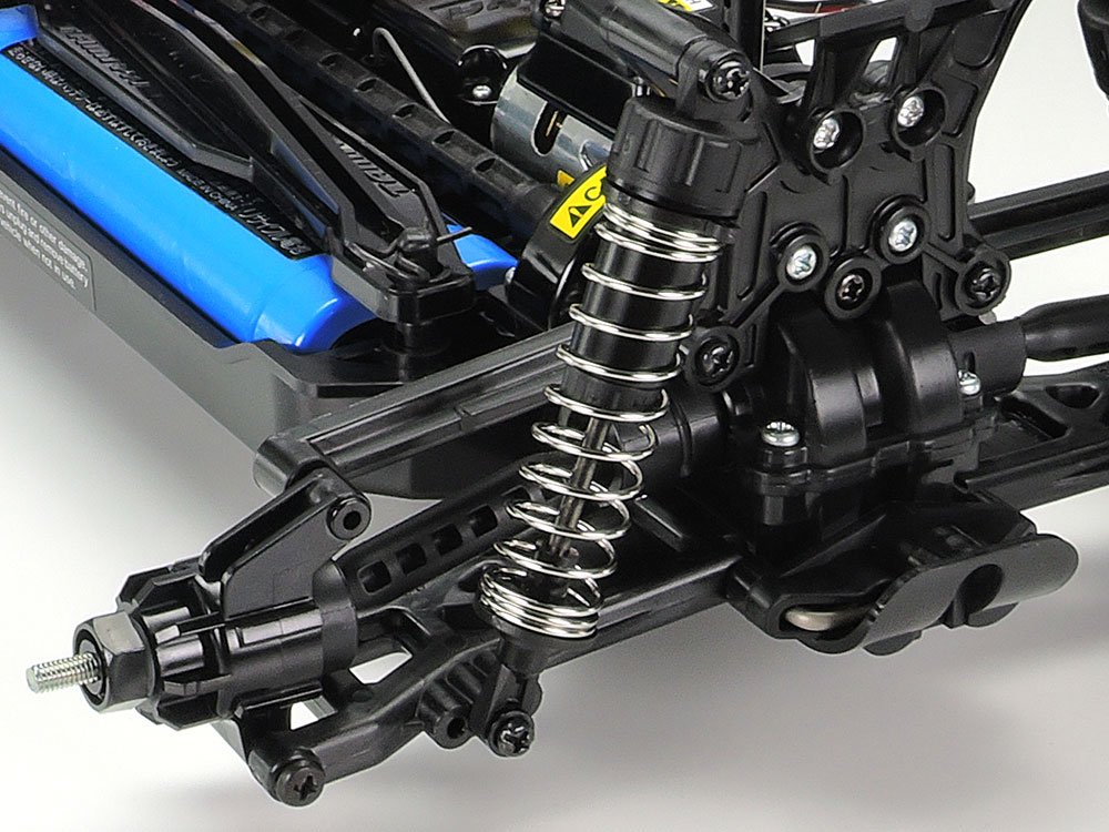 The rear suspension is shown here. Identical arm and upright parts ease assembly and maintenance.