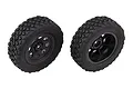 Two Team Associated RC front tyres pre-glued onto black multi-spoke rims, shown from front and rear angles.