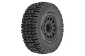 Pro-Line Mirage TT belted tyre mounted on a black removable hex SCT rim, viewed from a three-quarter angle against a white background.