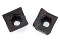 Two black rubber Rovan front steering hub nut holders shown from a top-down angle against a white background.