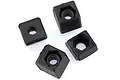 Four black square plastic nut holders for RC car rear bulkheads, arranged on a white background.