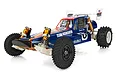 Studio shot of a Team Associated RC10 Jay Halsey Edition 1/10 scale 2WD electric RC buggy with blue and orange bodywork on a white background.