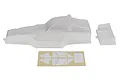 Clear, unpainted Team Associated RC10 Protech buggy body shell with a separate rear wing and a sheet of window masks on a white background.