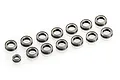A collection of thirteen metal ball bearings of varying sizes arranged on a white background.