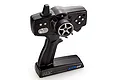 MST XTR-03 2.4GHz 3-channel pistol grip RC transmitter in black with silver steering wheel and buttons on a white background.
