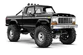 A black Traxxas TRX-4M Ford F-150 High Trail RC rock crawler truck shown from a front three-quarter angle on a white background.