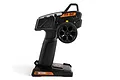 Side profile of a black HPI Racing TF-50 2.4GHz 3-channel RC transmitter with orange accents on a white background.
