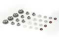 A set of metal RC differential gears, including bevel gears, flat washers, and small rubber O-rings, arranged on a white background.