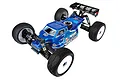A high-angle studio shot of a Team Associated RC8T4 nitro truggy kit, featuring a blue painted body, white wheels, and black off-road tires.