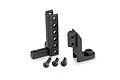 Traxxas boat trailer hitch set components including two black plastic mounting brackets and three small metal screws on a white background.