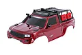 A red Traxxas TRX-4 Sport RC crawler body shell with a black roof rack, snorkel, and red fuel canisters, shown against a white background.