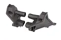 Two black plastic Traxxas rear shock tower components for an RC vehicle, shown from an angled perspective against a white background.