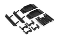 A set of black plastic RC car parts including skid plates, battery mounts, and chassis braces on a white background.