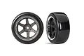 Two RC drift wheels with smooth black tyres and six-spoke grey rims with chrome lips, shown from front and angled views.
