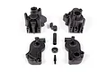 A set of black plastic Axial gearbox case components arranged on a white background.