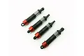 Four Hobby Plus RC shock absorbers with black bodies, red anodized collars, and silver springs arranged diagonally on a white background.