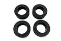 Four black circular foam tyre inserts arranged in a two-by-two grid on a white background.