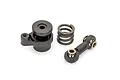 Traxxas servo saver assembly components including a plastic servo horn, a metal coil spring, and a steering link with ball ends.