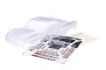 A clear, unpainted Traxxas Slash 1/10 scale RC short course truck body shell with an included decal sheet on a white background.