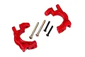 Two red Traxxas heavy duty caster blocks with two silver pins and two black screws on a white background.