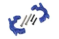 Two blue Traxxas heavy duty C-hub carriers with two silver hinge pins and two black screws on a white background.