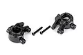 Two black Traxxas Extreme Heavy Duty steering hubs and two matching black screws on a white background.