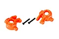 Two bright orange Traxxas Extreme Heavy Duty steering hubs with two black metal screws on a white background.