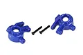 Two blue Traxxas Extreme Heavy Duty steering hubs and two black screws on a white background.
