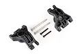 Two black plastic Traxxas heavy duty rear sub axle carriers with included metal hinge pins and screws on a white background.