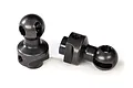 Two black steel CVD differential output balls for Traxxas RC vehicles, shown against a plain white background.