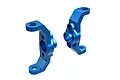 Two blue anodized aluminium caster blocks (C-hubs) for Traxxas RC vehicles, shown from different angles against a white background.