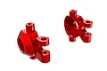 Two red anodized aluminium steering hubs for Traxxas RC vehicles, shown from different angles against a white background.