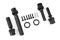 A set of Traxxas centre driveshaft components including four black plastic driveshaft parts, two O-rings, six small screws, and two metal pins.