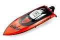 A high-angle studio shot of a red and black UDI Rapid RC speed boat on a white background.