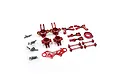 A collection of red anodized aluminium RC car upgrade parts including steering knuckles, suspension arms, and drive shafts on a white background.