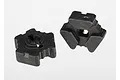 Two black plastic Traxxas differential locker parts shown from different angles against a white background.
