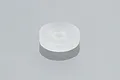 A single small, translucent white silicone gasket or washer for an RC boat, shown on a plain grey surface.