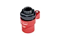A red GPM Racing aluminium 23T servo horn with an integrated black servo saver mechanism, shown against a white background.