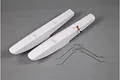 A set of white foam RC plane floats with metal landing gear struts on a grey background.