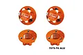 Four orange GPM Racing 17mm aluminium wheel lock nuts shown from top and bottom angles against a white background.