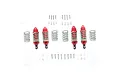 GPM Racing aluminium shock absorber set in red, including four shocks, eight springs, and various mounting screws and spacers on a white background.