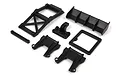 A set of black plastic RC car body parts including a rear wing, roll cage, and mounting brackets for the BlackZon Spryte ST.