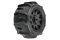 A single Pro-Line 1.9 inch Dumont paddle tyre pre-mounted on a black Raid wheel, shown in a studio setting.