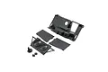 A set of black plastic RC car spare parts including a rear bulkhead, fan panel with dual fan grilles, and two mudguards on a white background.