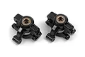 A pair of black plastic RC steering hub and hub carrier assemblies with bronze-coloured metal bushings, isolated on a white background.