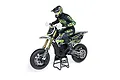 Losi Promoto-SM FXR Supermoto 1/4 scale RC motorcycle in white, black, and neon green livery with a rider figure on a display stand.