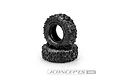 Two JConcepts 1.9 inch Megalithic crawler tyres stacked on a white background, showing detailed tread patterns and sidewall branding.