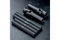 A set of MST CVD driveshaft components including two universal joint ends and several splined shafts on a black textured surface.