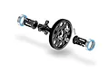 Exploded view of an XRAY slipper eliminator kit showing the spur gear, outdrives, bearings, and mounting hardware.