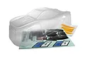 A clear, unpainted polycarbonate body shell for a 1/10 scale Maverick Quantum2 XT RC truck, shown with included decal sheets on a white background.